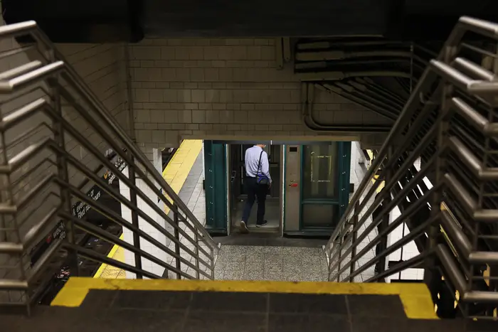 A person enters the elevator in the Atlantic Avenue-Barclays Center subway station.
